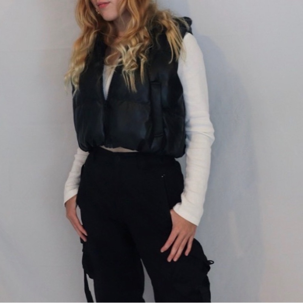 Black hooded H&M puffer vest.